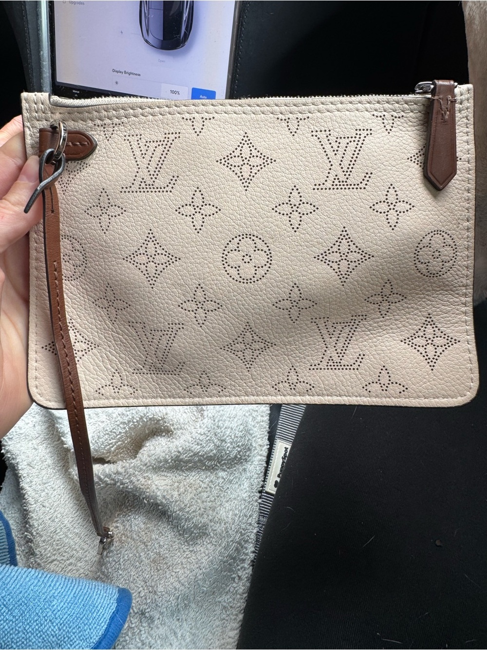 Louis Vuitton Perforated Monogram Wristlet in Light Beige with Brown Trim